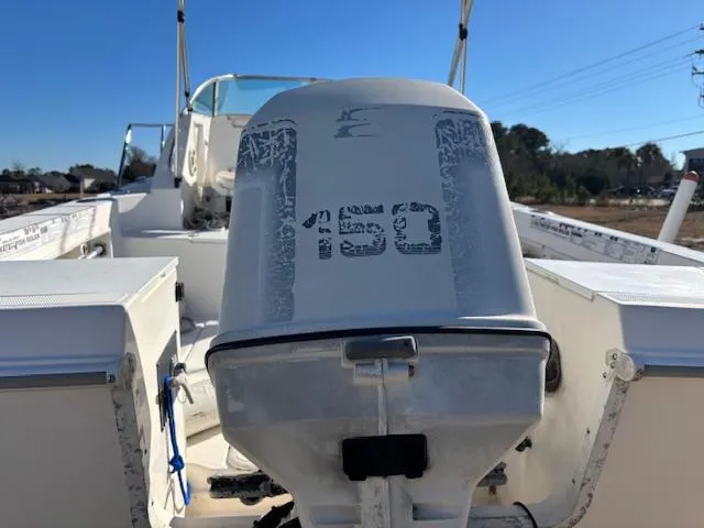 Slide: The Image of 1997 Wellcraft 210 Coastal boat with 150 HP outboard motor, interior view. - 7