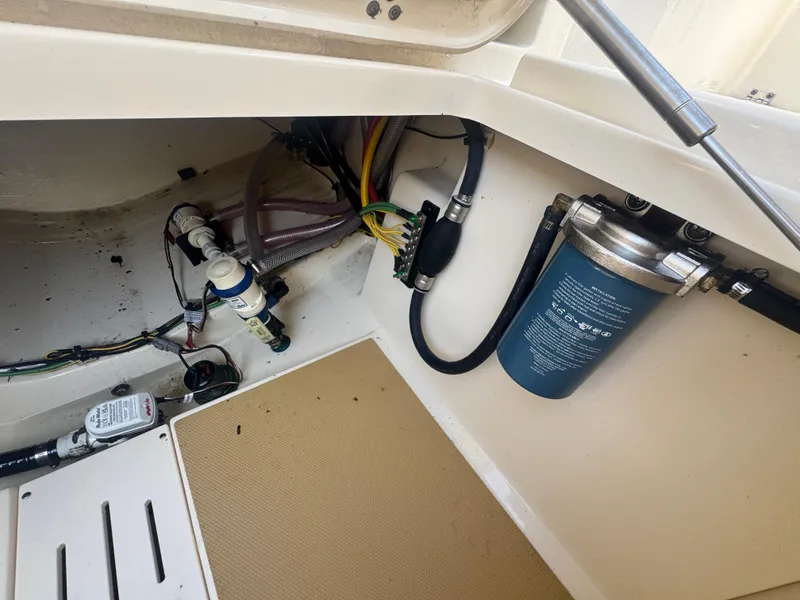 Slide: The Image of 2023 Scout 255 LXF boat interior wiring and filtration system. - 28