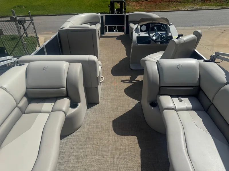 Slide: The Image of 2022 Cypress Cay Seabreeze 232 pontoon boat with spacious seating and modern helm. - 3