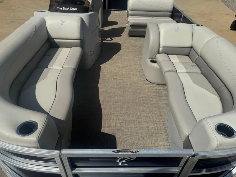 Slide: The Image of 2022 Cypress Cay Seabreeze 232 pontoon boat with spacious seating and modern design. - 8