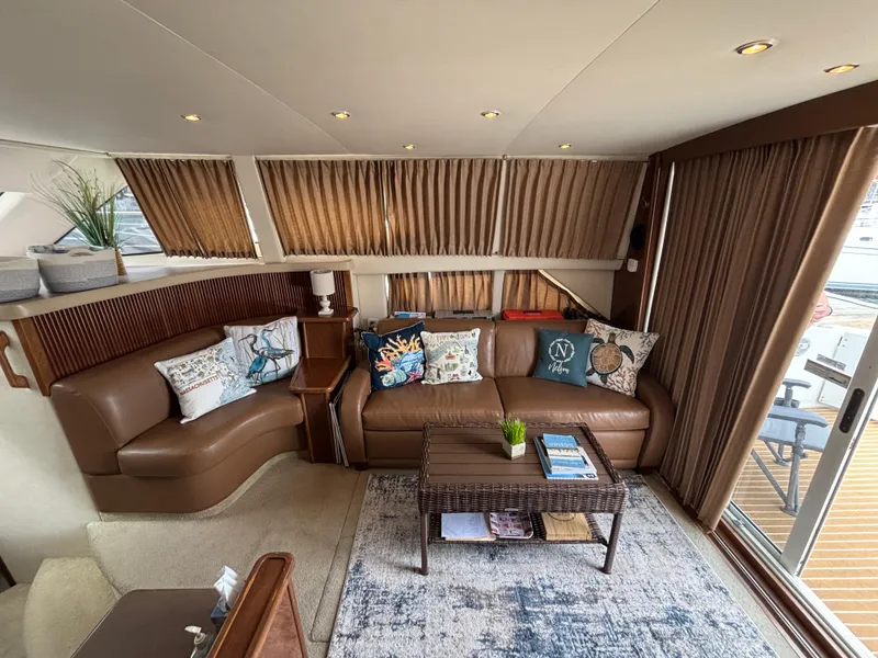 Slide: The Image of Luxurious interior of 2007 Carver 35 Super Sport yacht with cozy seating and decor. - 15