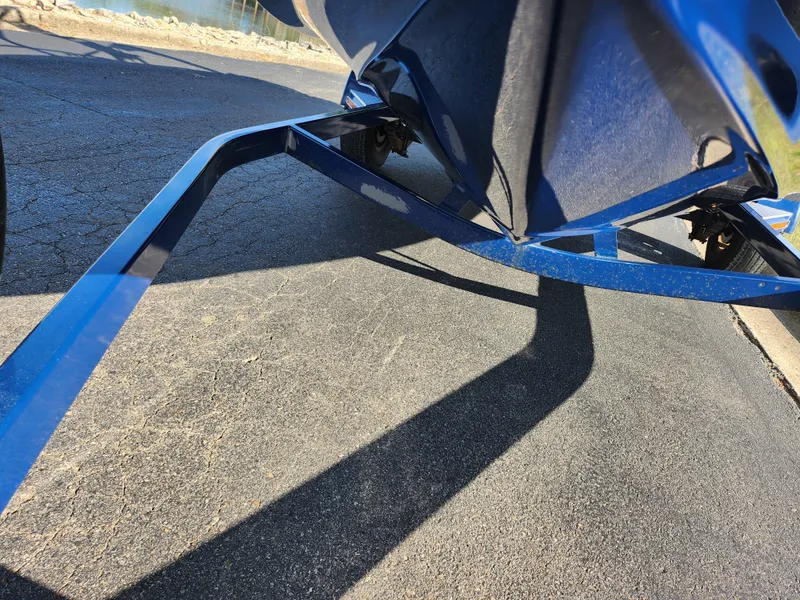 Slide: The Image of 2012 Crownline 195 SS boat on trailer, close-up view of hull and frame. - 7