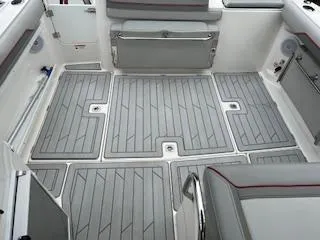 Slide: The Image of 2023 Solara S-250 DC boat interior with gray cushioned seating and non-slip flooring. - 21