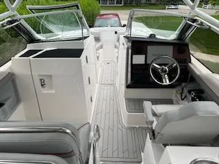 Slide: The Image of 2023 Solara S-250 DC boat interior with modern helm and seating. - 25