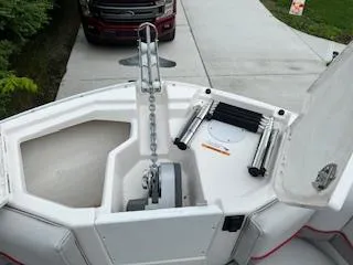 Slide: The Image of 2023 Solara S-250 DC boat anchor system on a driveway, with a truck in the background. - 40