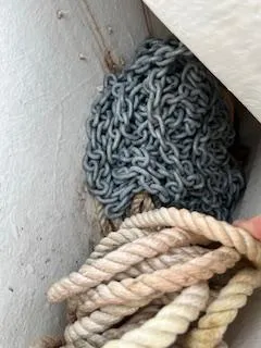 Slide: The Image of Rope and chain storage on a 2023 Solara S-250 DC boat. - 42