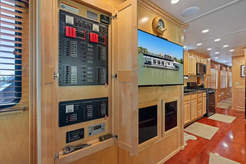Slide: The Image of Interior of 2007 American Waterways Widebody with control panel and modern kitchen. - 25