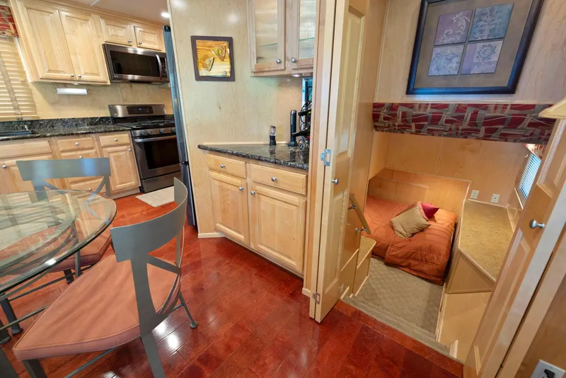 Slide: The Image of Modern kitchen and cozy sleeping area in 2007 American Waterways Widebody houseboat. - 31