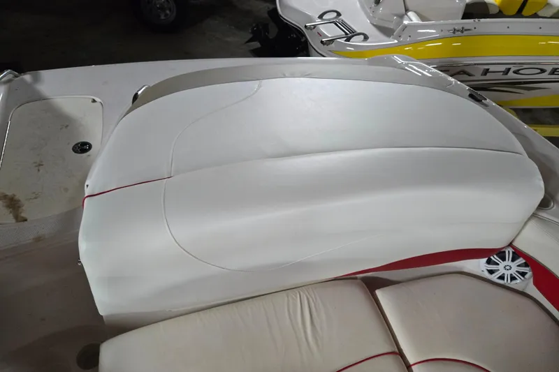 Slide: The Image of 2006 Tahoe 204 WT boat interior with white and red seating. - 33
