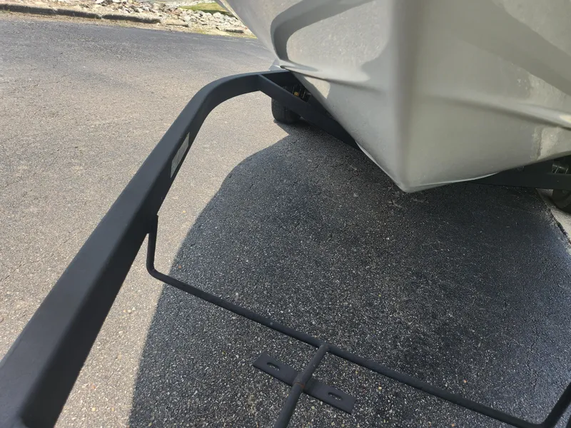 Slide: The Image of 2014 Crownline 21 SS boat on trailer, close-up view of hull and trailer frame. - 7