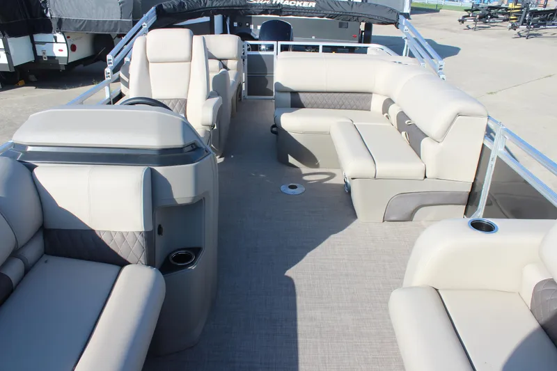Slide: The Image of 2025 Sun Tracker Party Barge 22 RF DLX with spacious seating and modern design. - 22