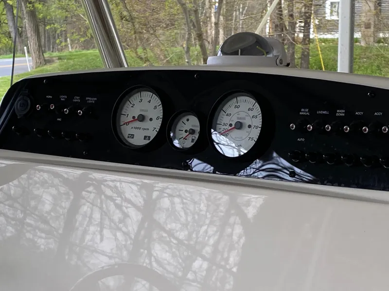 Slide: The Image of Dashboard of 2026 Pioneer 202 Islander boat with gauges and controls. - 10