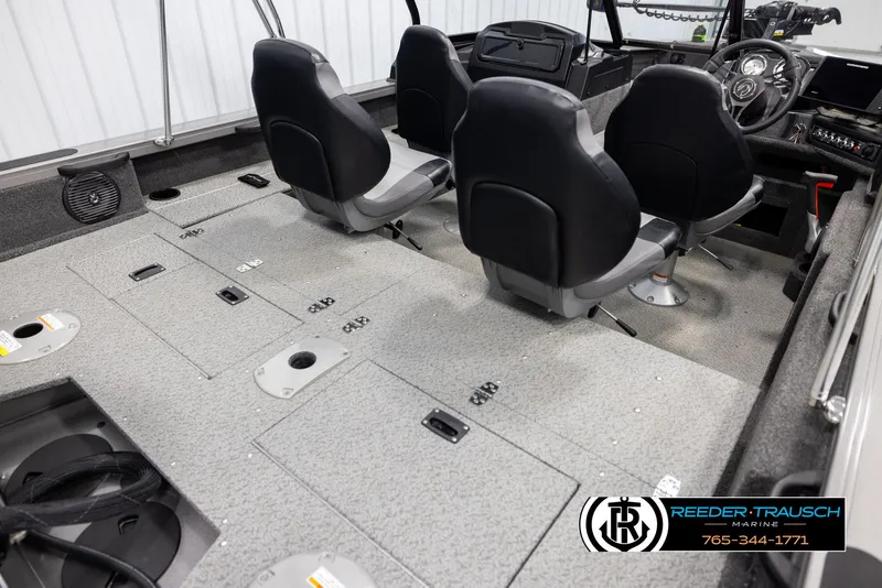 Slide: The Image of 2022 Crestliner 1850 FISHHAWK boat interior with seating and control panel. - 11