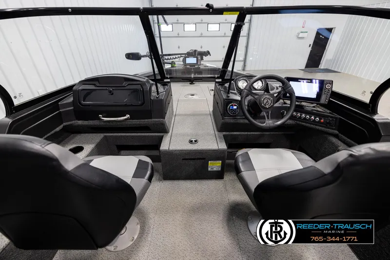 Slide: The Image of Interior of 2022 Crestliner 1850 FISHHAWK boat with dual seats and control panel. - 13