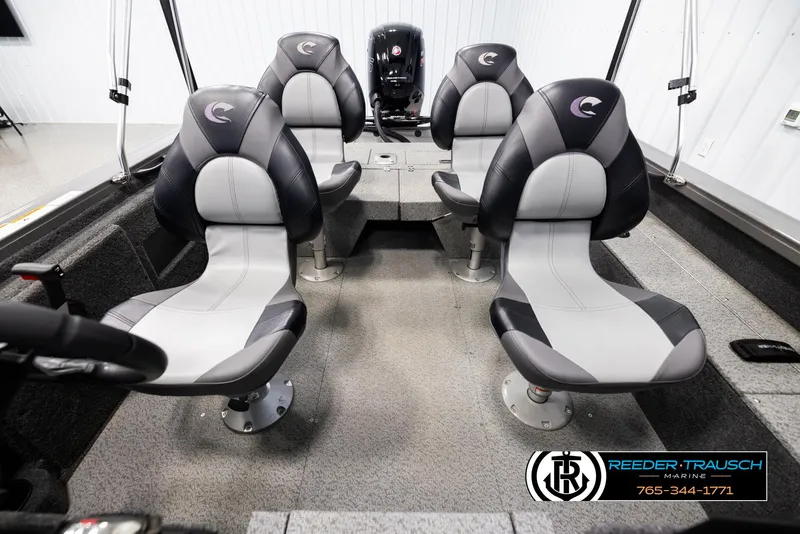 Slide: The Image of 2022 Crestliner 1850 FISHHAWK boat interior with four gray and black seats. - 17