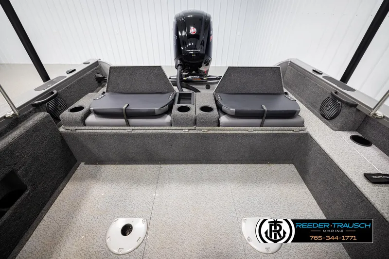 Slide: The Image of 2022 Crestliner 1850 FISHHAWK boat interior with seating and motor, Reeder-Trausch Marine logo. - 25