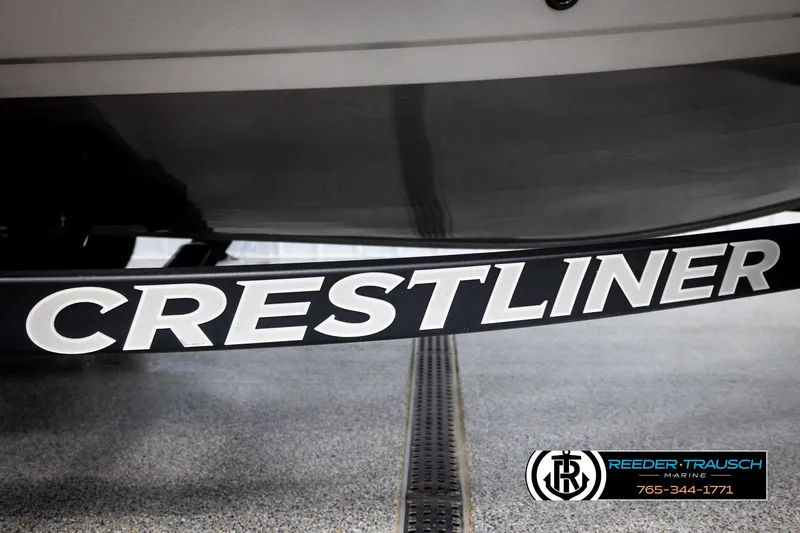 Slide: The Image of Crestliner 1850 FISHHAWK 2022 boat detail with Reeder-Trausch Marine logo. - 49