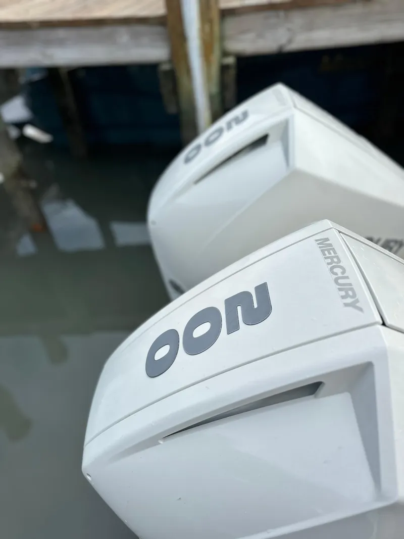 Slide: The Image of 2021 Sea Ray SDX 290 Outboard with Mercury engines at dockside. - 19