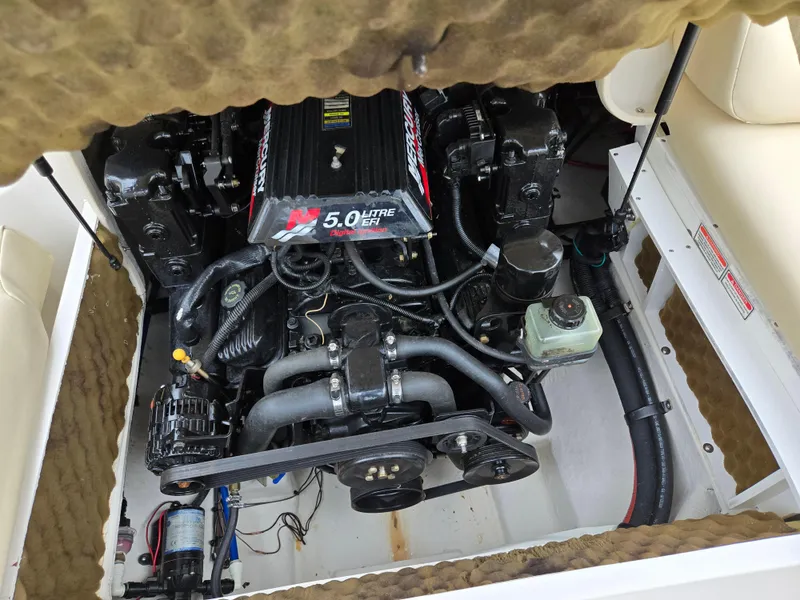 Slide: The Image of Engine compartment of a 2001 Sea Ray 210 Sundeck with 5.0-liter engine. - 23