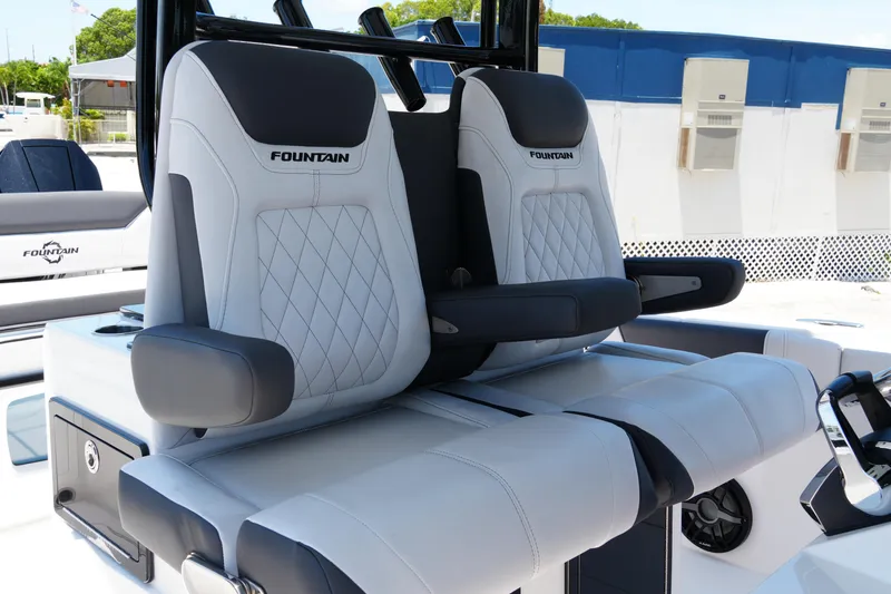 Slide: The Image of Luxury seating on 2025 Fountain 32NX boat, featuring sleek design and premium materials. - 21