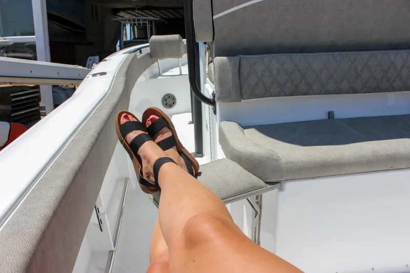 Slide: The Image of Relaxing on a 2026 Sea Hunt Ultra 245 SE boat with comfortable seating. - 20