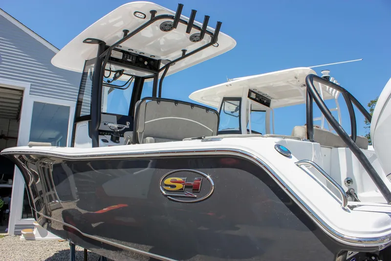 Slide: The Image of 2026 Sea Hunt Ultra 245 SE boat with sleek design and modern features. - 6