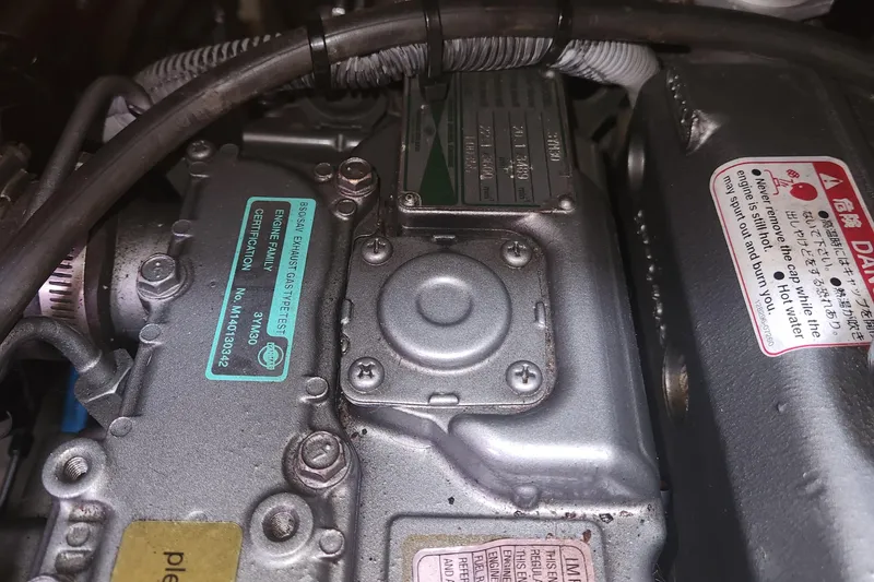 Slide: The Image of Engine compartment of a 2004 Hunter 36, showing detailed labels and components. - 25