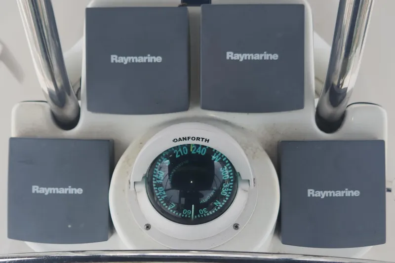 Slide: The Image of Compass and Raymarine navigation equipment on a 2004 Hunter 36 sailboat. - 27