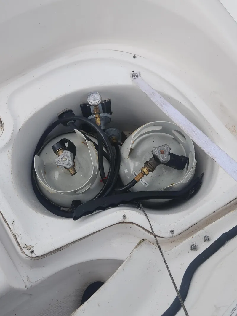 Slide: The Image of Two propane tanks in a compartment of a 2004 Hunter 36 boat. - 8