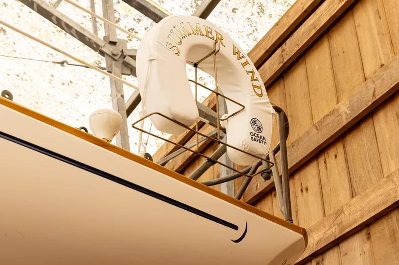 Slide: The Image of Lifebuoy labeled "Summer Wind" on 1964 Concordia 39 sailboat. - 30