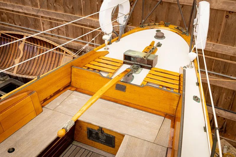 Slide: The Image of 1964 Concordia 39 sailboat interior with wooden details and classic design elements. - 31