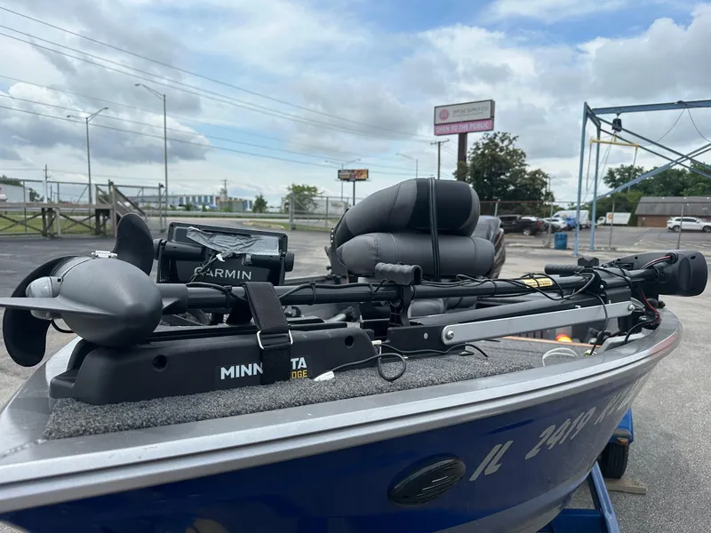 Slide: The Image of 2020 Crestliner 1450 Discovery Tiller boat with Garmin and Minn Kota equipment. - 5