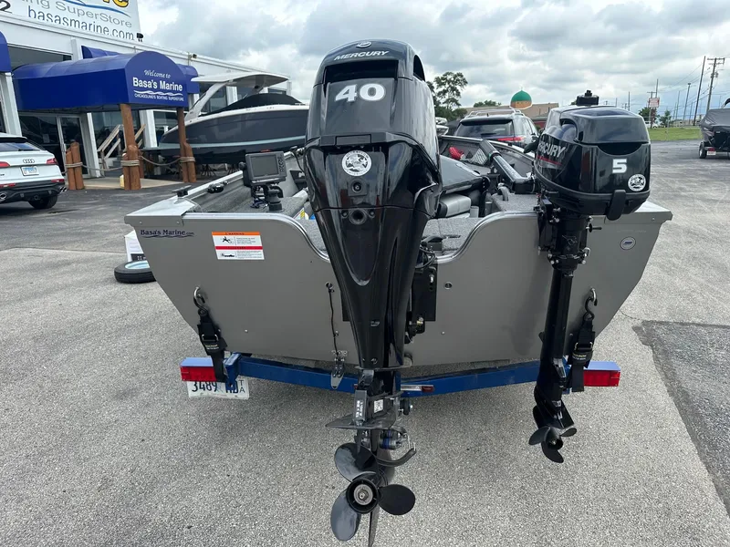Slide: The Image of 2020 Crestliner 1450 Discovery Tiller boat with dual Mercury outboard motors at Basa's Marine. - 8