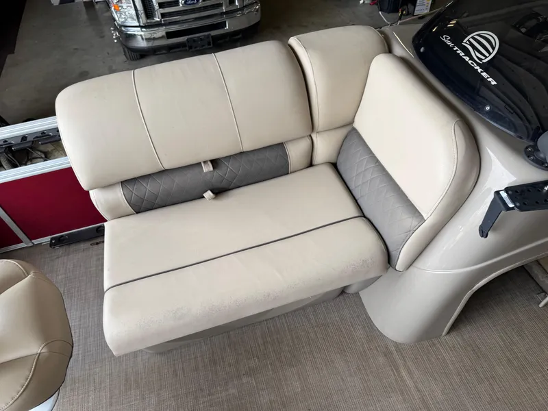 Slide: The Image of 2021 Sun Tracker Fishin' Barge 20 DLX boat seating, beige and gray upholstery. - 7