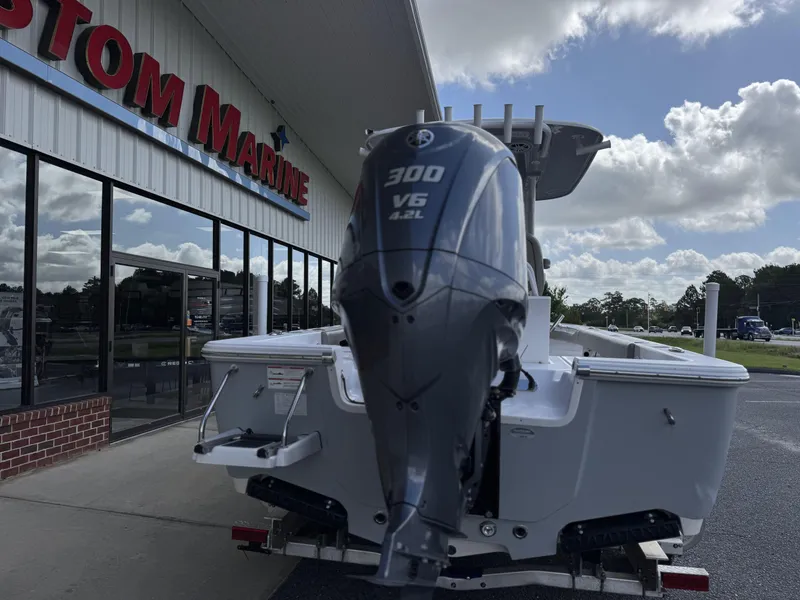 Slide: The Image of 2024 Sportsman Masters 247OE Bay Boat with Yamaha 300 V6 engine at Custom Marine dealership. - 3