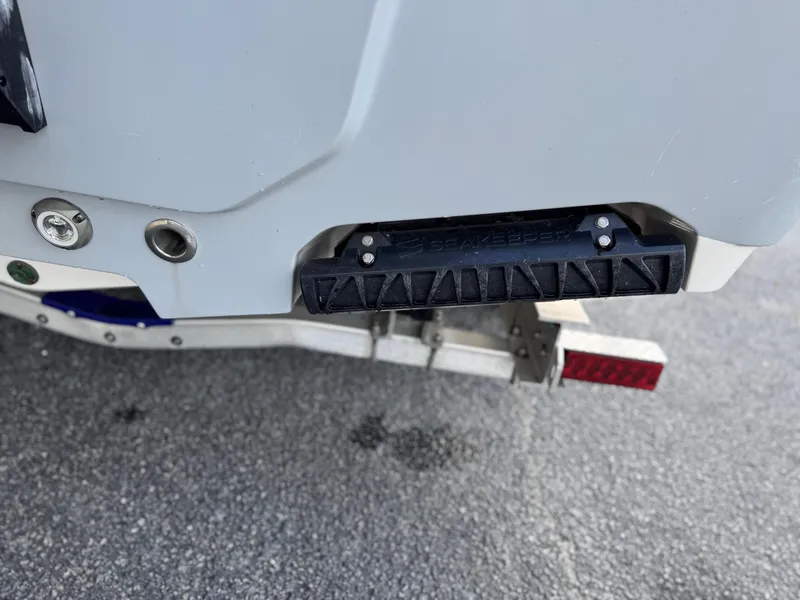 Slide: The Image of 2024 Sportsman Masters 247OE Bay Boat with Seakeeper stabilizer on trailer. - 4