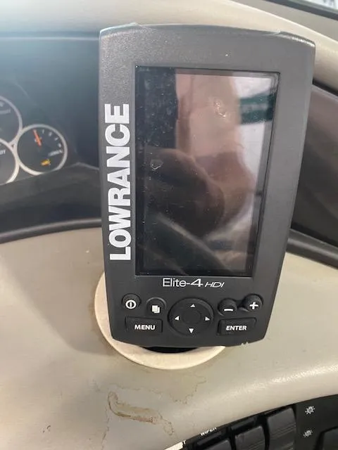 Slide: The Image of Lowrance Elite-4 HDI fishfinder on 2000 Four Winns 200 Horizon dashboard. - 9