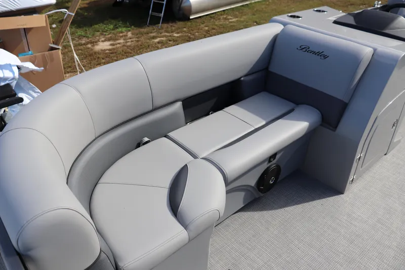 Slide: The Image of 2025 Bentley Pontoons 220 Navigator with luxurious gray seating and sleek design. - 1