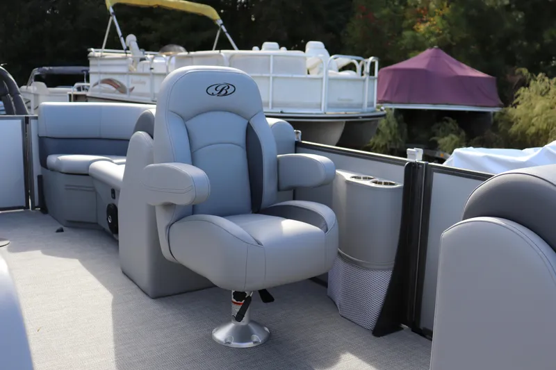 Slide: The Image of 2025 Bentley Pontoons 220 Navigator with luxurious seating and modern design. - 5