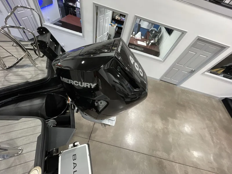 Slide: The Image of Balise Horizon 26C boat with Mercury 400 engine in showroom, 2025 model. - 11
