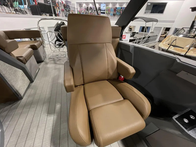 Slide: The Image of Luxurious brown captain's chair in 2025 Balise Horizon 26C boat interior. - 18