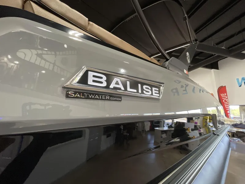 Slide: The Image of 2025 Balise Horizon 26C Saltwater Edition boat in showroom. - 9