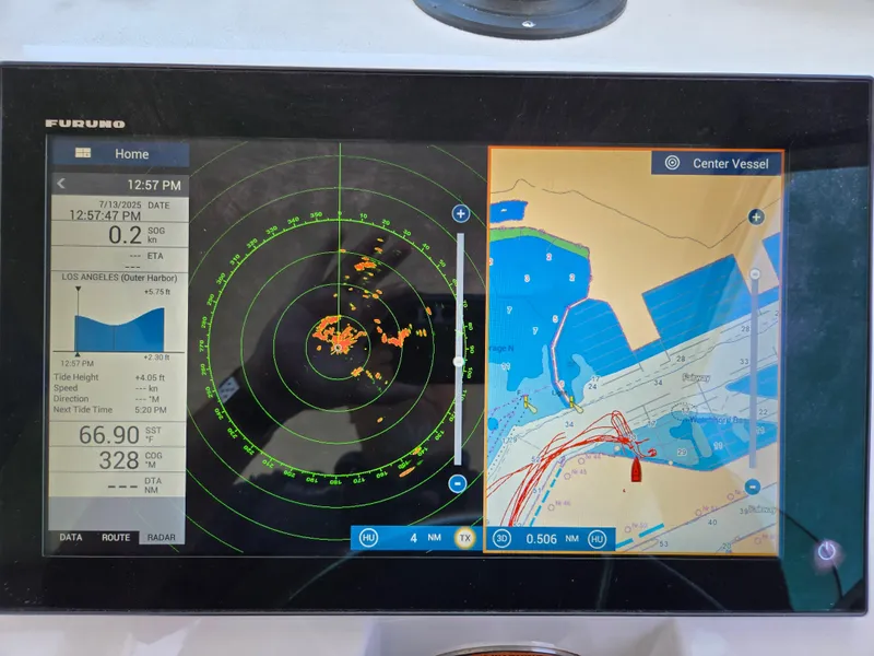 Slide: The Image of Boat navigation system display on a 2019 Parker 2520 DV, showing radar and map data. - 41