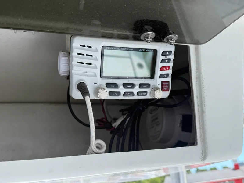 Slide: The Image of VHF radio installed on a 2018 Sea Pro 228 Bay boat console. - 10