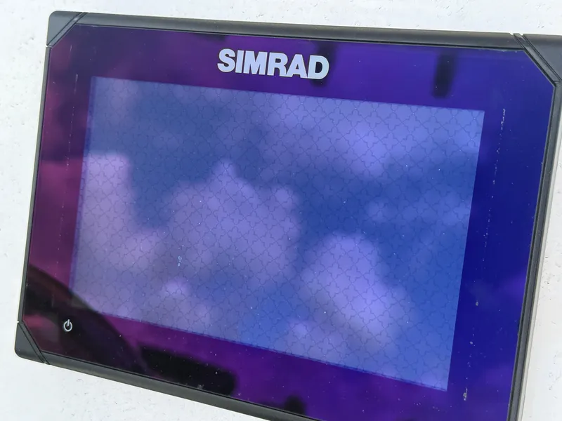 Slide: The Image of Simrad display screen on a 2018 Sea Pro 228 Bay boat. - 7