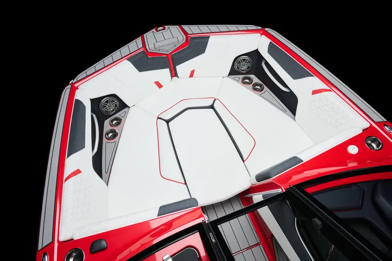 Slide: The Image of 2026 Nautique Super Air Nautique GS22 boat interior with red and white seating. - 1