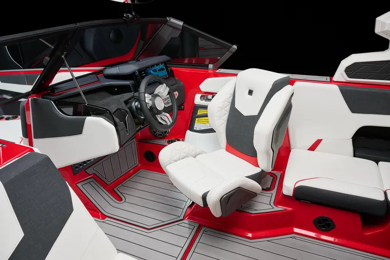 Slide: The Image of 2026 Nautique Super Air Nautique GS22 interior with modern dashboard and luxurious seating. - 2