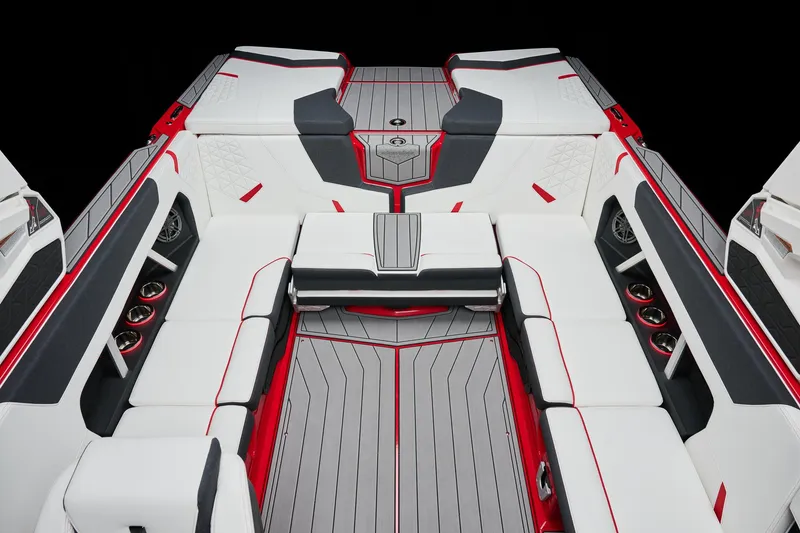 Slide: The Image of 2026 Nautique Super Air Nautique GS22 interior, featuring sleek white and red seating design. - 3