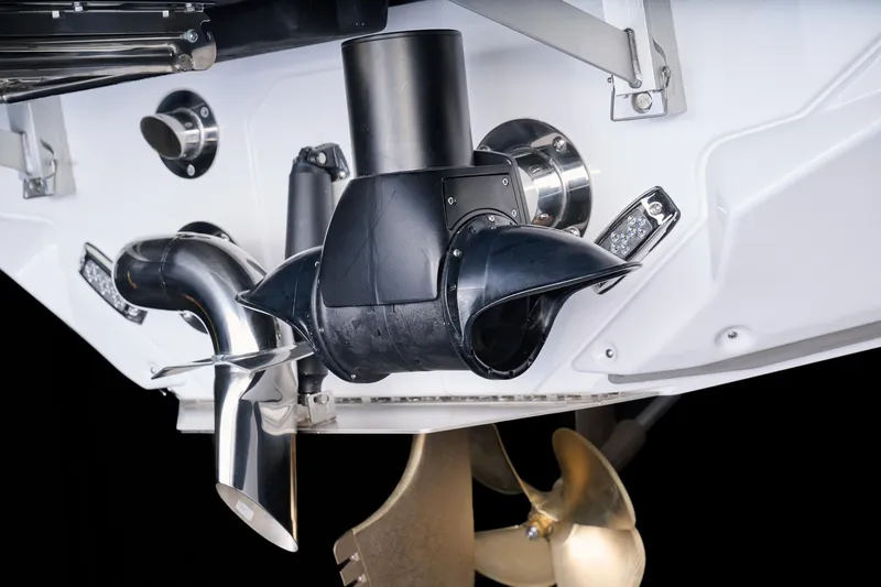 Slide: The Image of 2026 Nautique Super Air Nautique GS22 boat propeller and exhaust system close-up. - 7