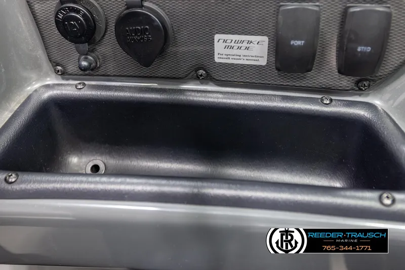 Slide: The Image of Control panel of 2013 Yamaha Boats 210 SX with audio and no wake mode features. - 35